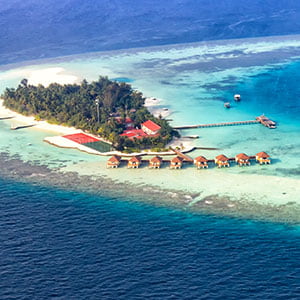 Aerial view of the Maayafushi Resort island, in Maldives.