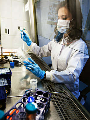 Female researcher working in a laboratory.