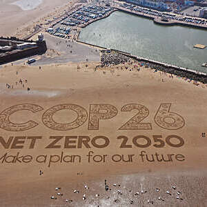 A giant sand artwork adorns New Brighton Beach to highlight global warming and the forthcoming Cop26 global climate conference on May 31, 2021 in Wirral, Merseyside